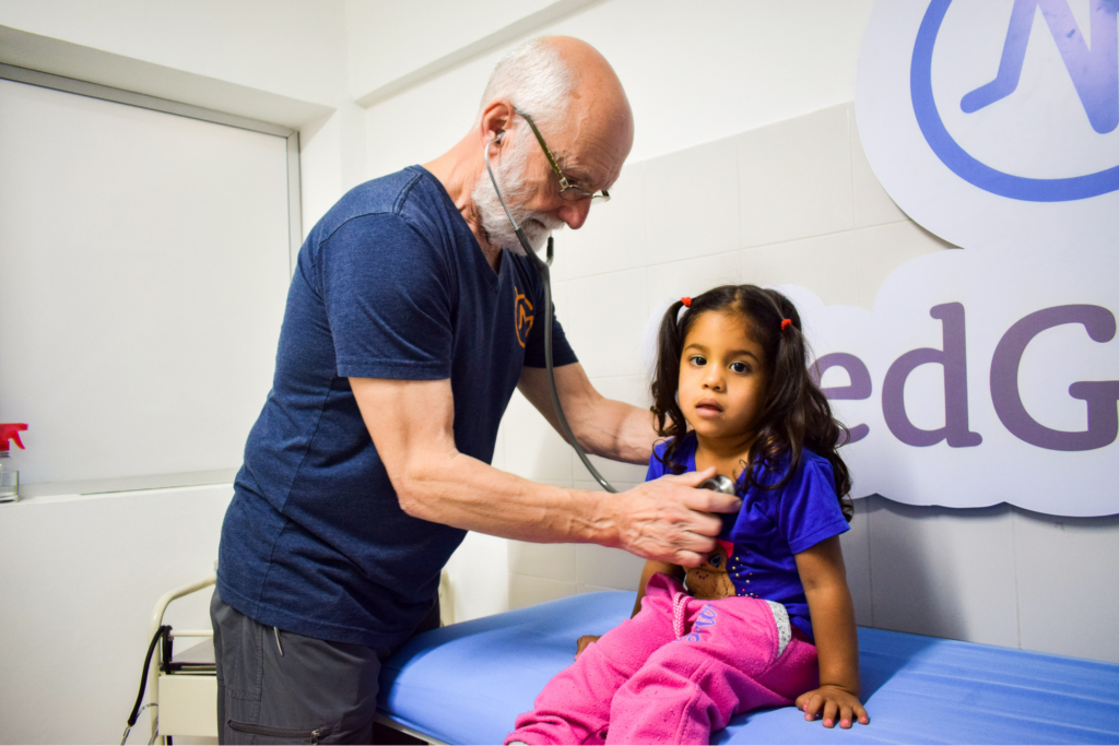 Dr. John Kahler with patient.